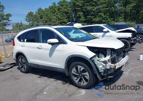 2015 Honda Cr-V Touring z USA, uszkodzony, nr VIN 5J6RM4H92FL116338